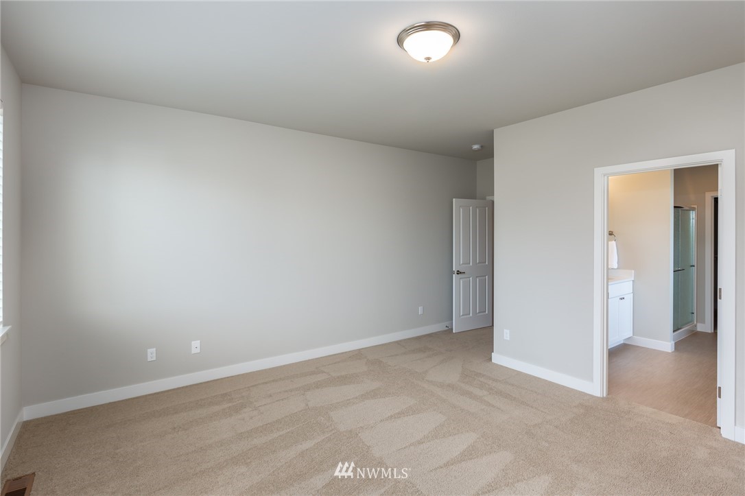 11 Lillian Ridge Court Sequim, WA 98382 - Photo 12 of 30 an empty room with an entryway