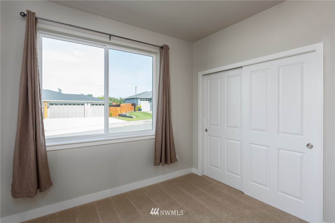 11 Lillian Ridge Court Sequim, WA 98382 - Photo 18 of 30 an empty room with windows