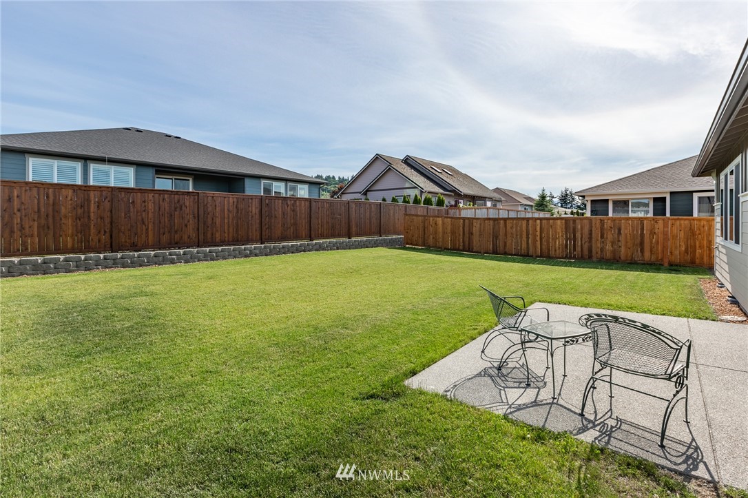 11 Lillian Ridge Court Sequim, WA 98382 - Photo 25 of 30 a view of yard with swimming pool and green yard