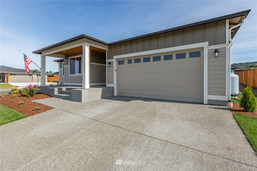 11 Lillian Ridge Court Sequim, WA 98382 - Photo 29 of 30 a front view of a house with a yard