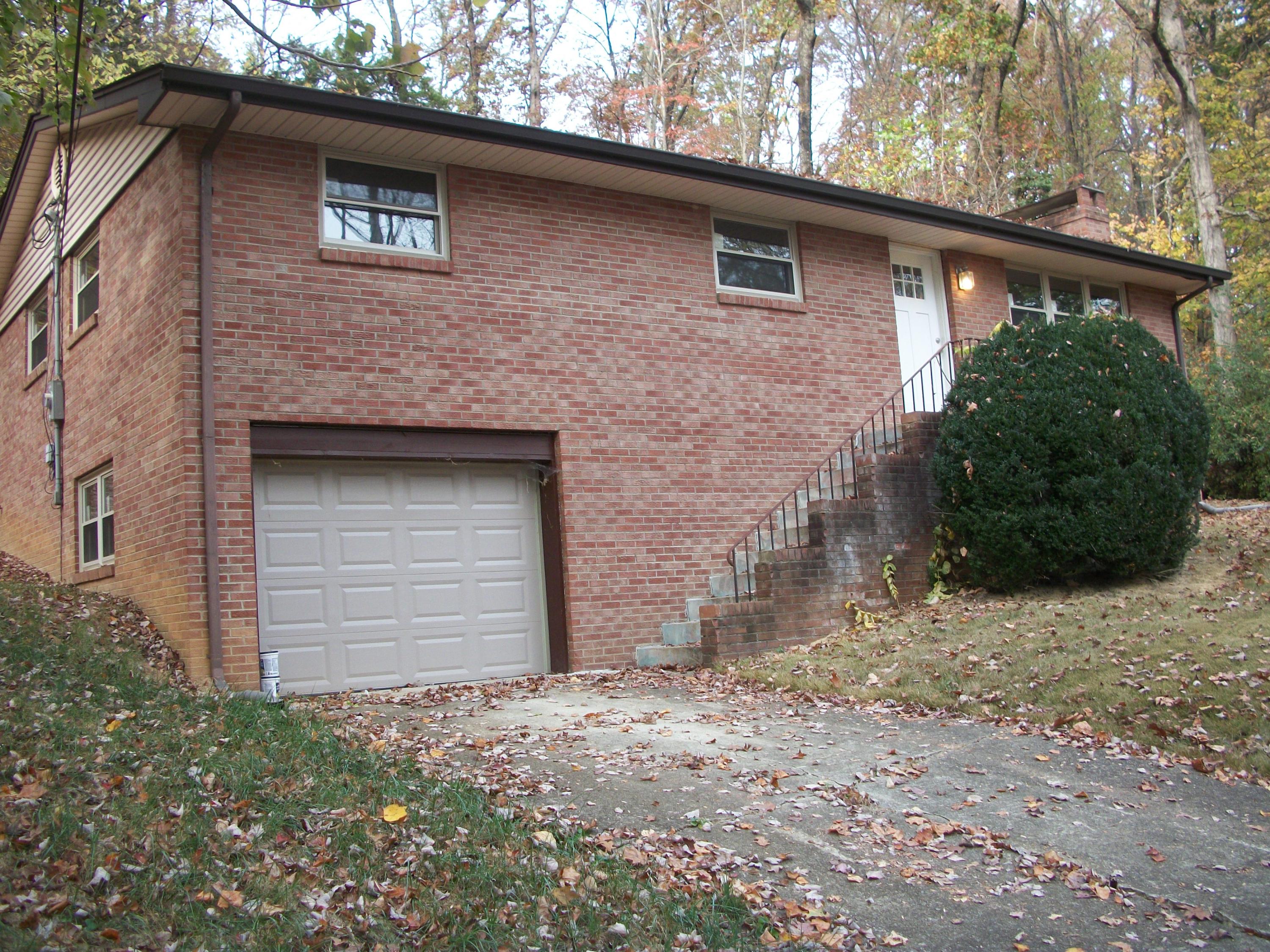 123 Maple Tree Lane Powell, TN 37849 - Photo 1 of 11 front