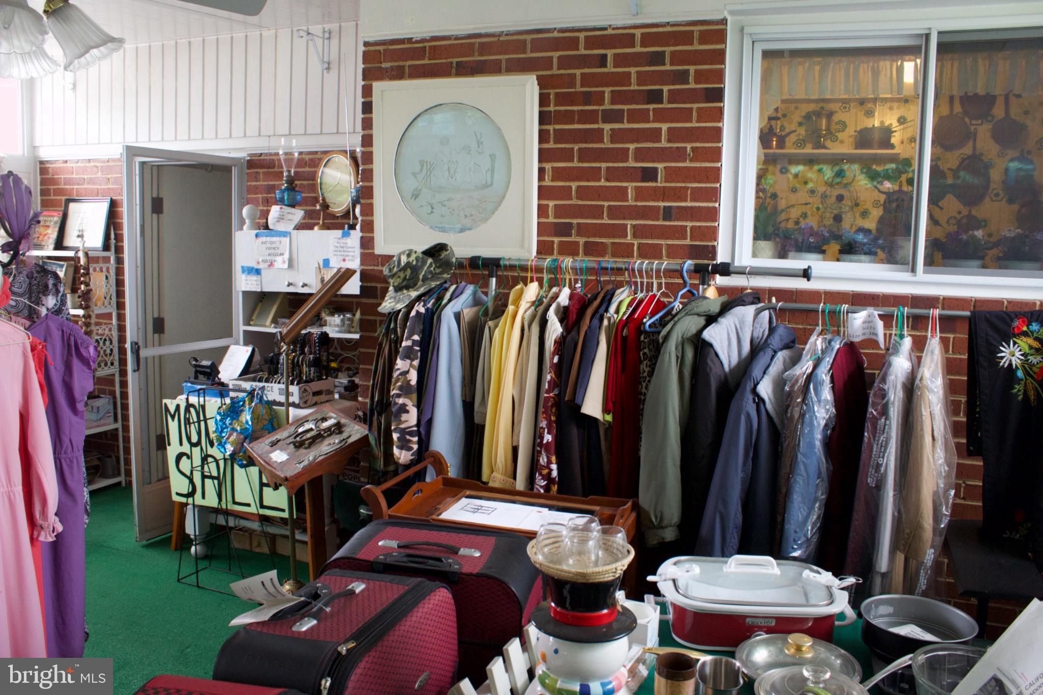 526 South Carlin Springs Road Arlington, VA 22204 - Photo 26 of 33 a view of walk in closet with clothes and shoes