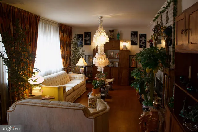 a bedroom with a bed and a desk