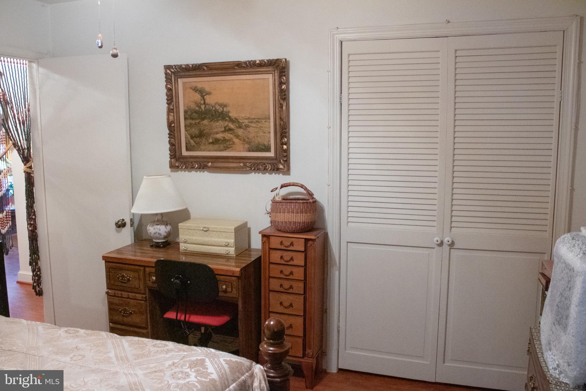 526 South Carlin Springs Road Arlington, VA 22204 - Photo 7 of 33 a bedroom with a bed and a desk