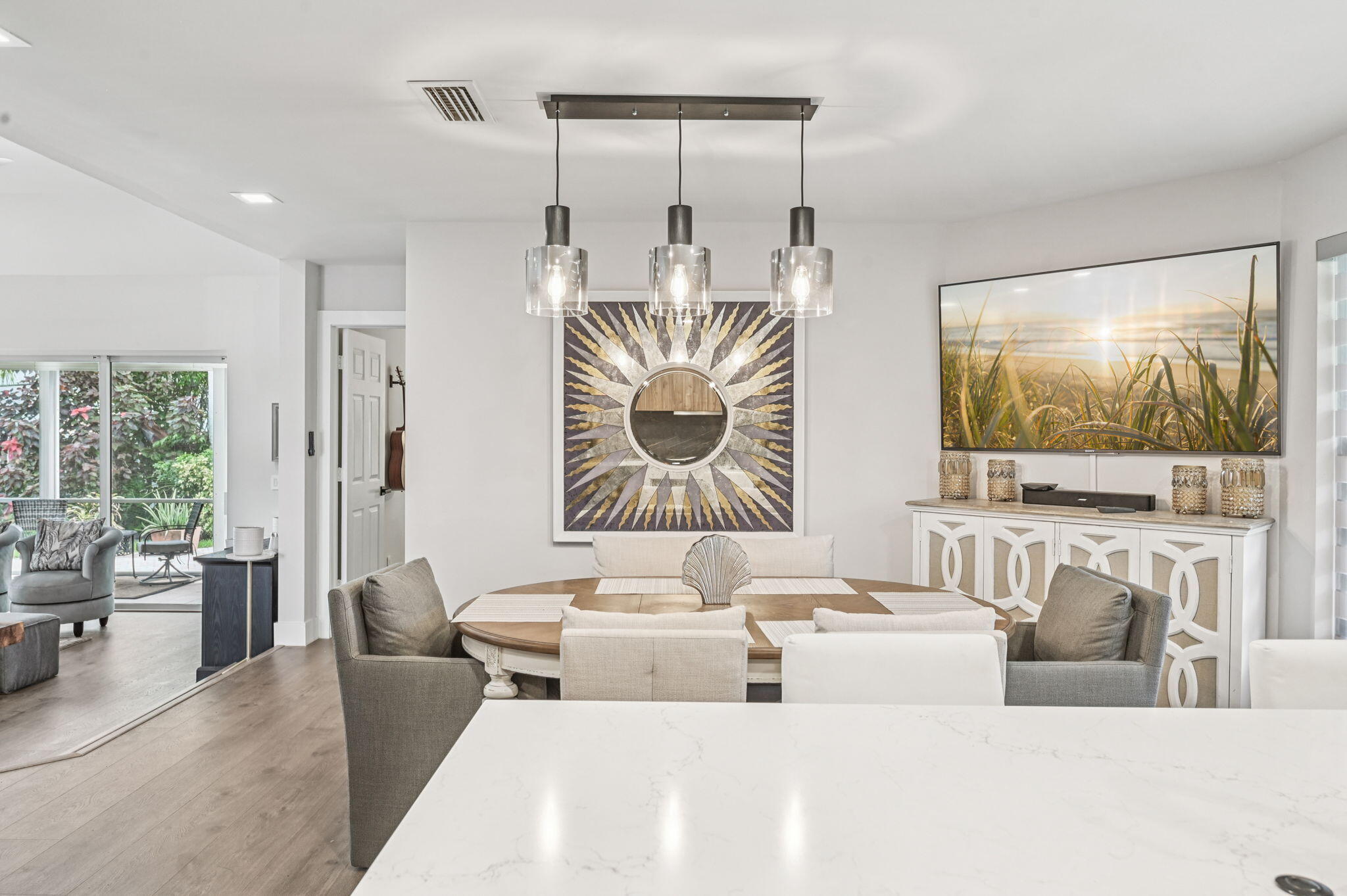 660 Forsyth Street, Unit 7 Boca Raton, FL 33487 - Photo 10 of 27 a living room with furniture and a flat screen tv
