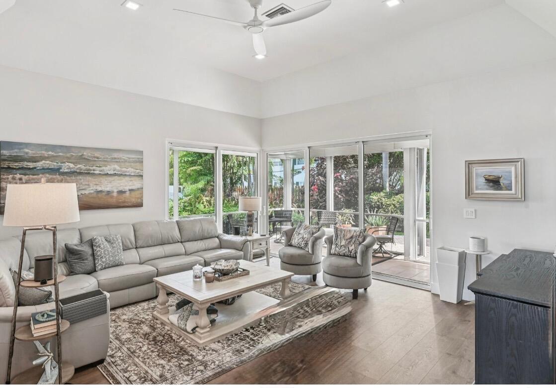 660 Forsyth Street, Unit 7 Boca Raton, FL 33487 - Photo 11 of 27 a living room with furniture and a large window