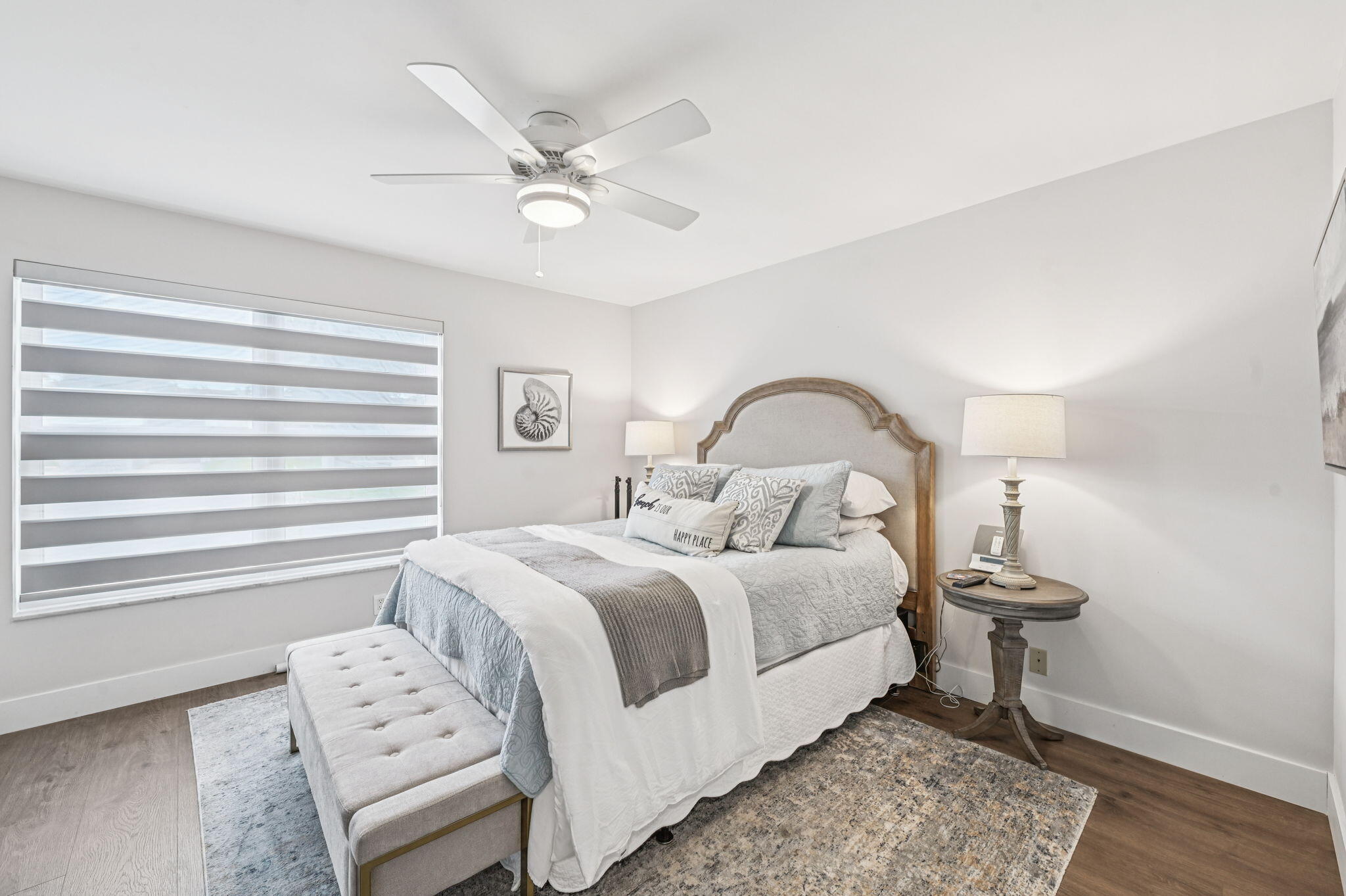 660 Forsyth Street, Unit 7 Boca Raton, FL 33487 - Photo 17 of 27 a bedroom with a bed and a chandelier