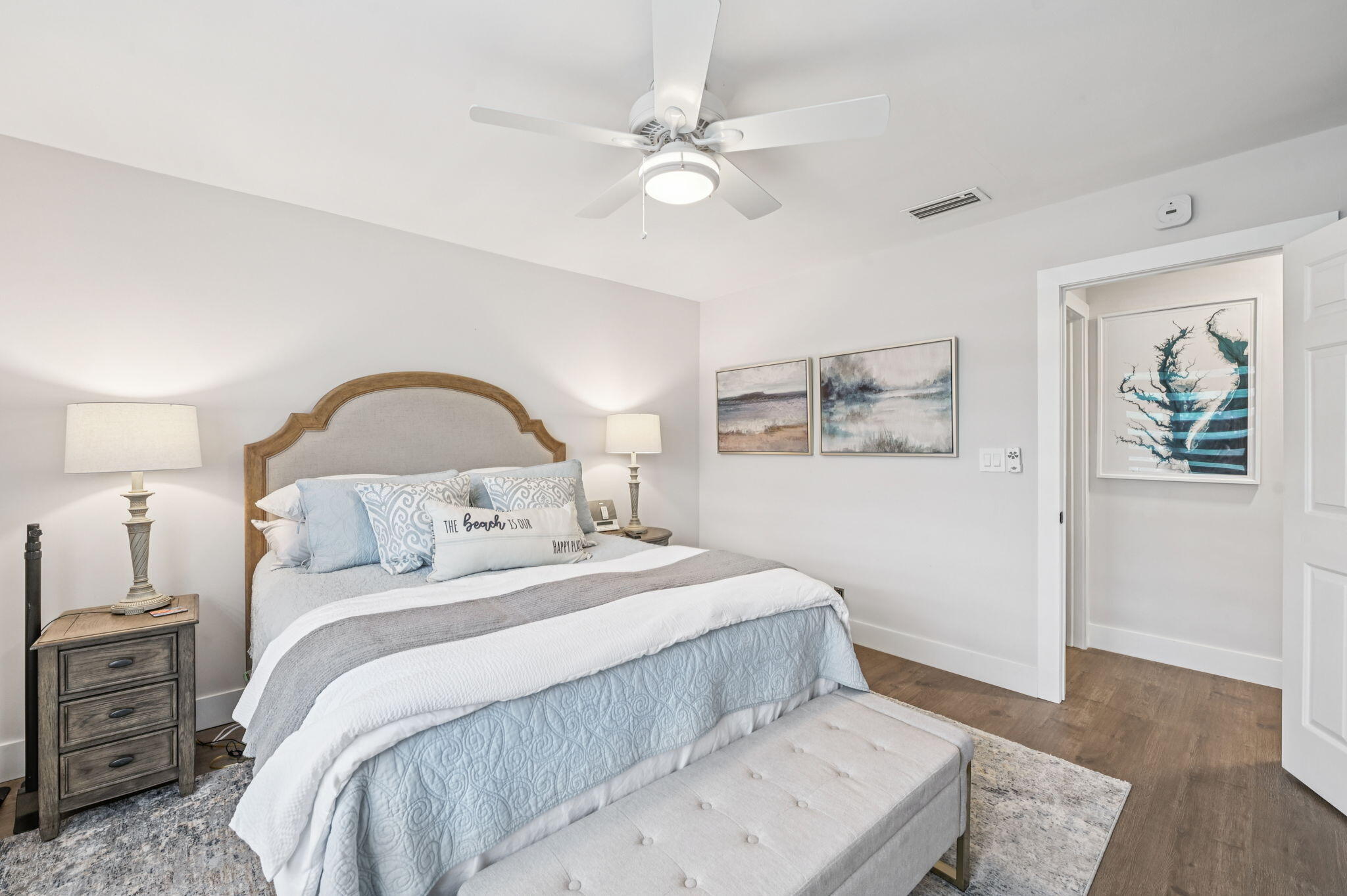 660 Forsyth Street, Unit 7 Boca Raton, FL 33487 - Photo 18 of 27 a bedroom with a bed and a large window