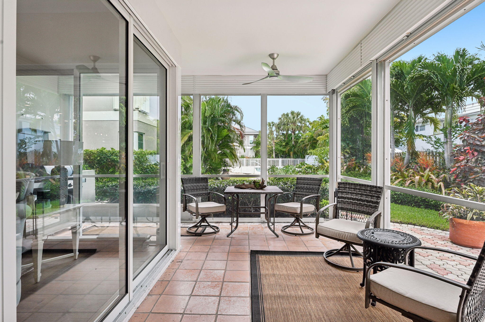 660 Forsyth Street, Unit 7 Boca Raton, FL 33487 - Photo 22 of 27 a living room with patio furniture and garden view