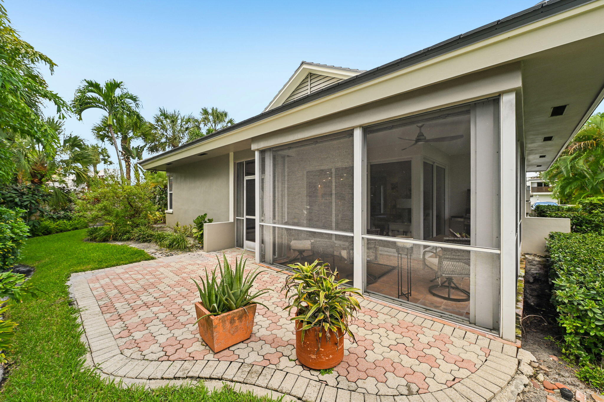 660 Forsyth Street, Unit 7 Boca Raton, FL 33487 - Photo 23 of 27 a view of a two chairs in the patio