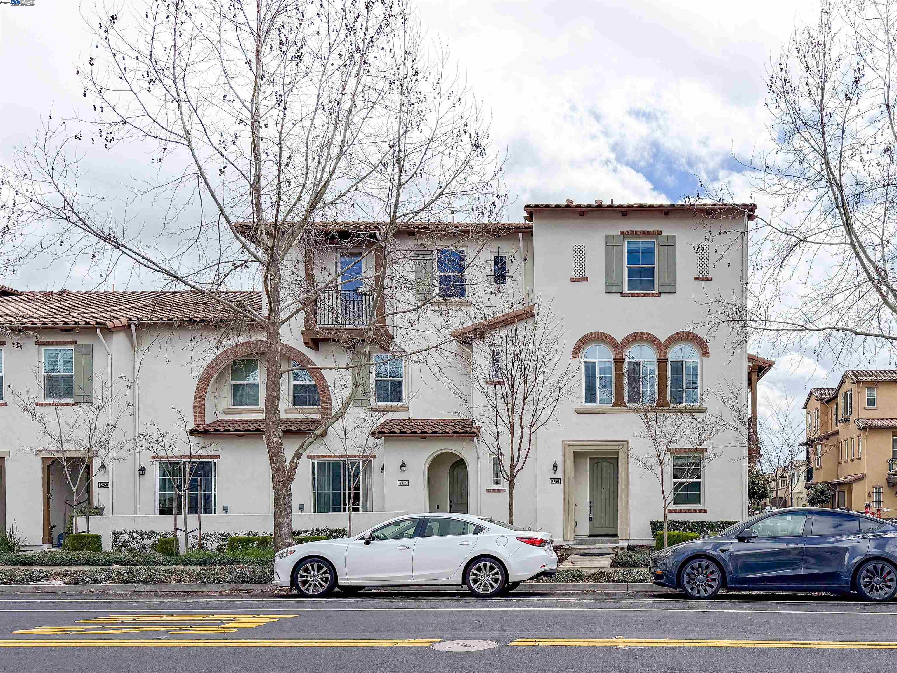 6256 Main Branch Road San Ramon, CA 94582 - Photo 1 of 1 a white building that has a tree in front of it
