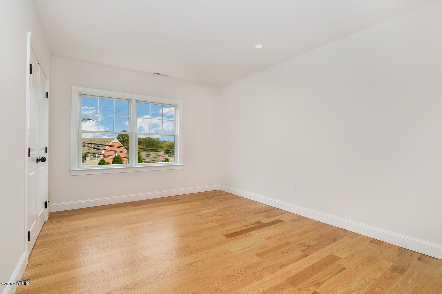 8 Sound Beach Ave Extension, Unit 4 Riverside, CT 06878 - Photo 12 of 25 an empty room with windows