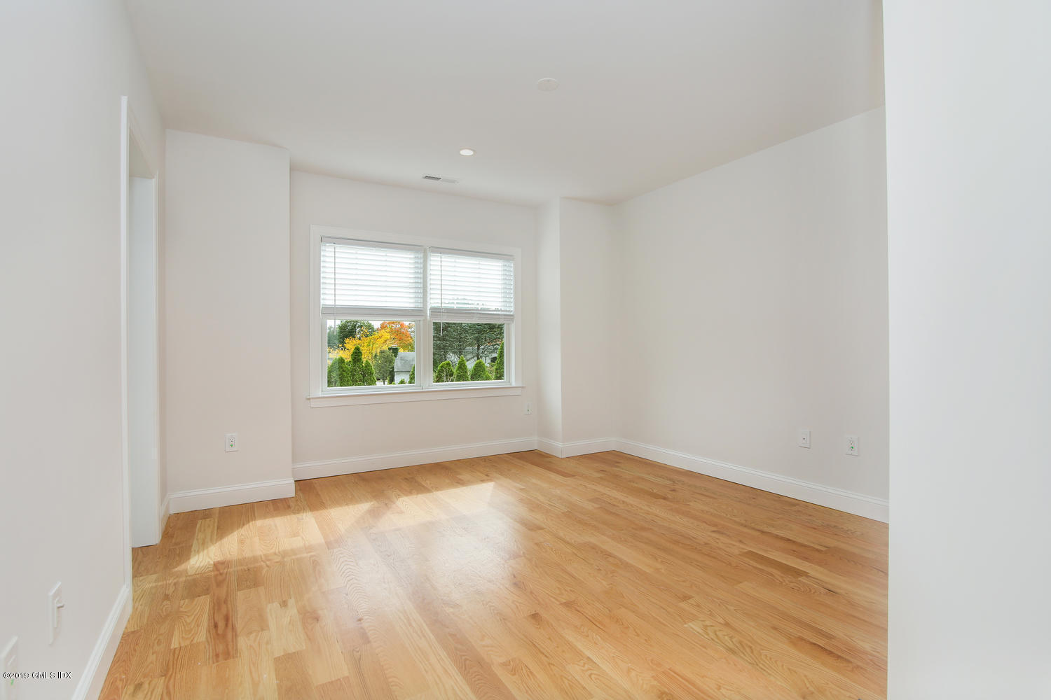 8 Sound Beach Ave Extension, Unit 4 Riverside, CT 06878 - Photo 14 of 25 a view of an empty room with a window
