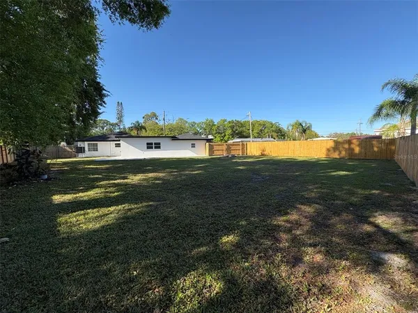 a view of a lake from a yard