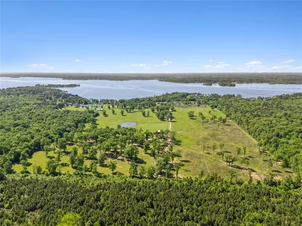 a view of a lake with a city