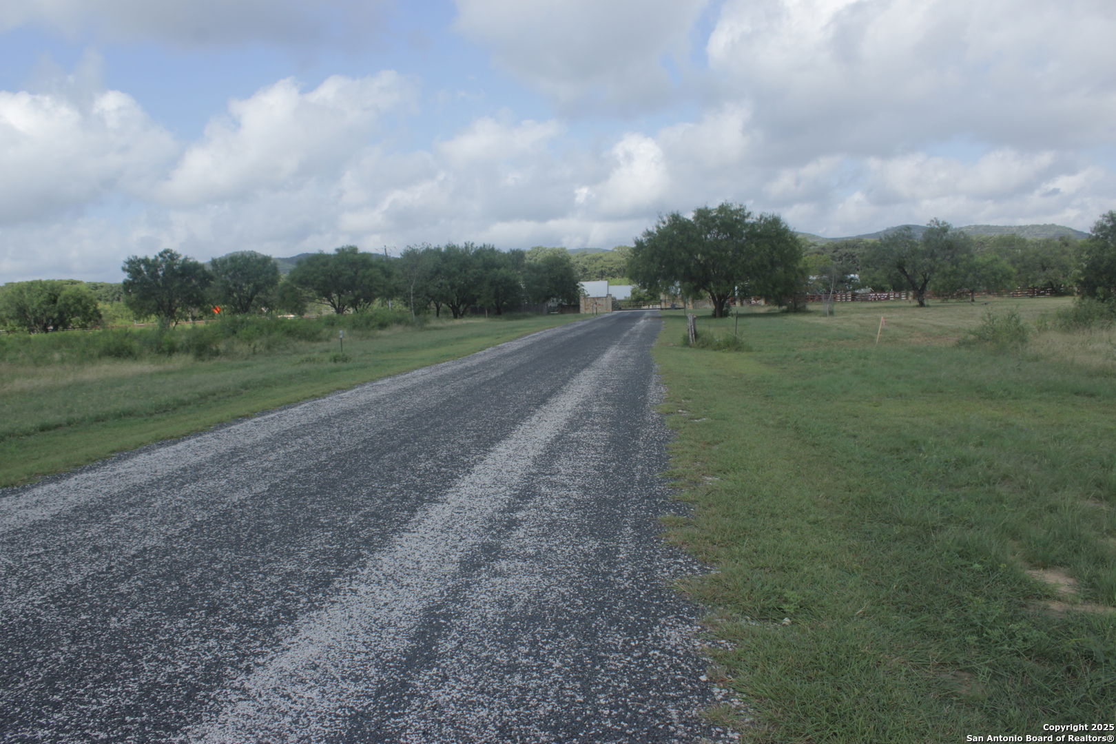 79 Ridge Loop Rio Frio, TX 78879 - Photo 3 of 11 a view of a field with trees in background
