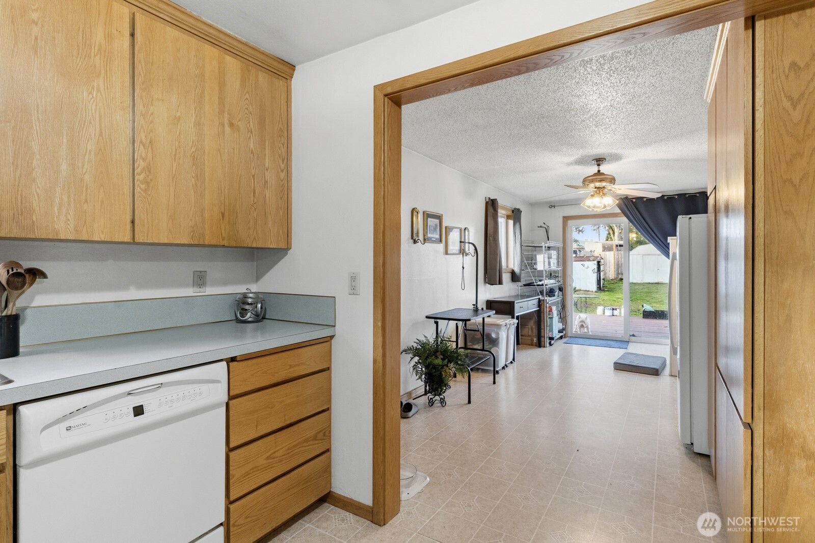 237 167th Street South Spanaway, WA 98387 - Photo 13 of 30 a kitchen with a sink and cabinets