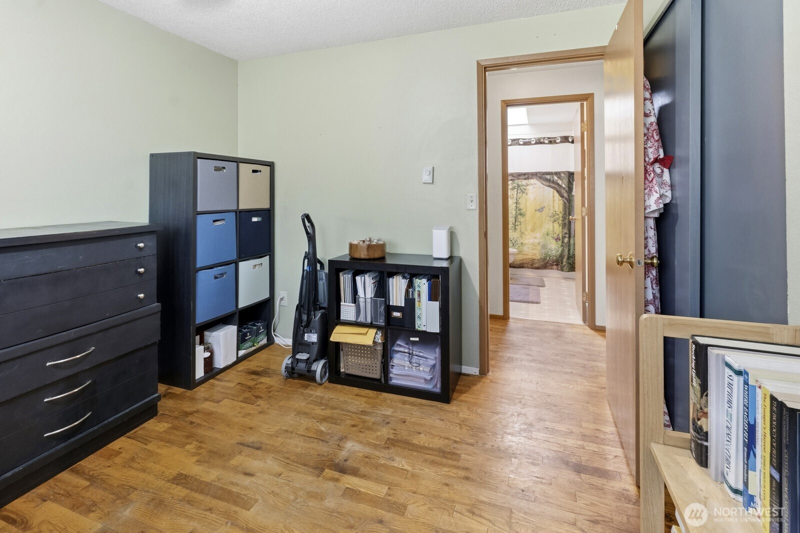 237 167th Street South Spanaway, WA 98387 - Photo 18 of 30 a living room with furniture and a wooden floor