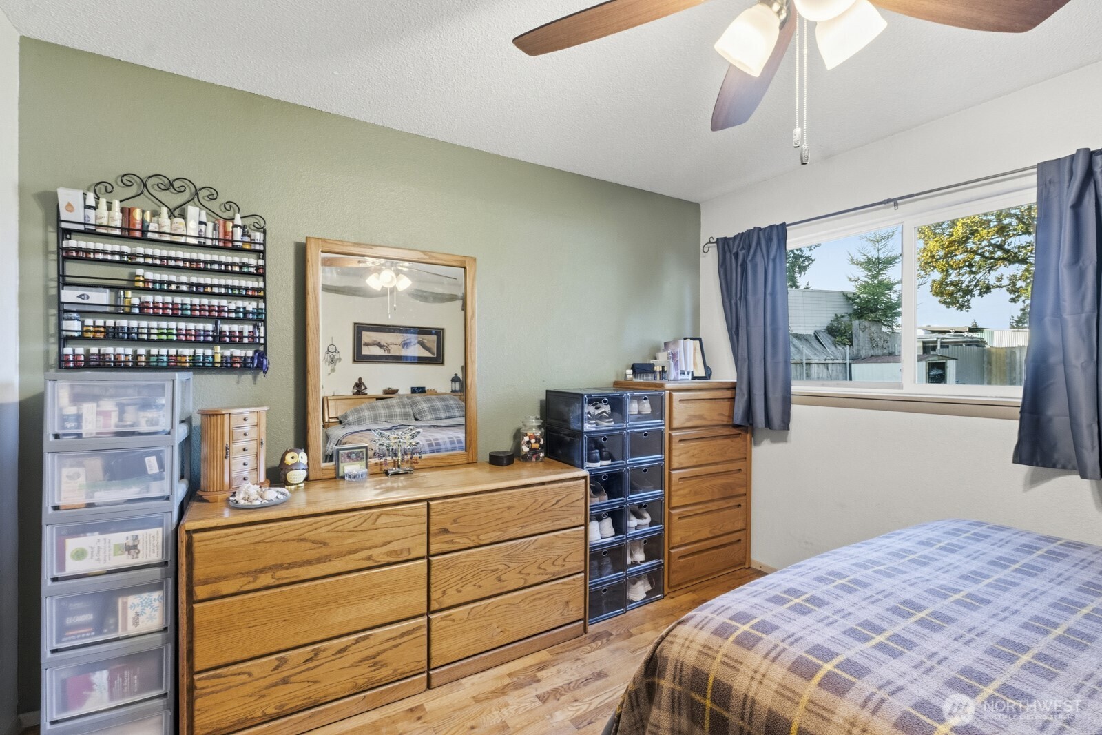 237 167th Street South Spanaway, WA 98387 - Photo 20 of 30 a bedroom with a bed and a dresser