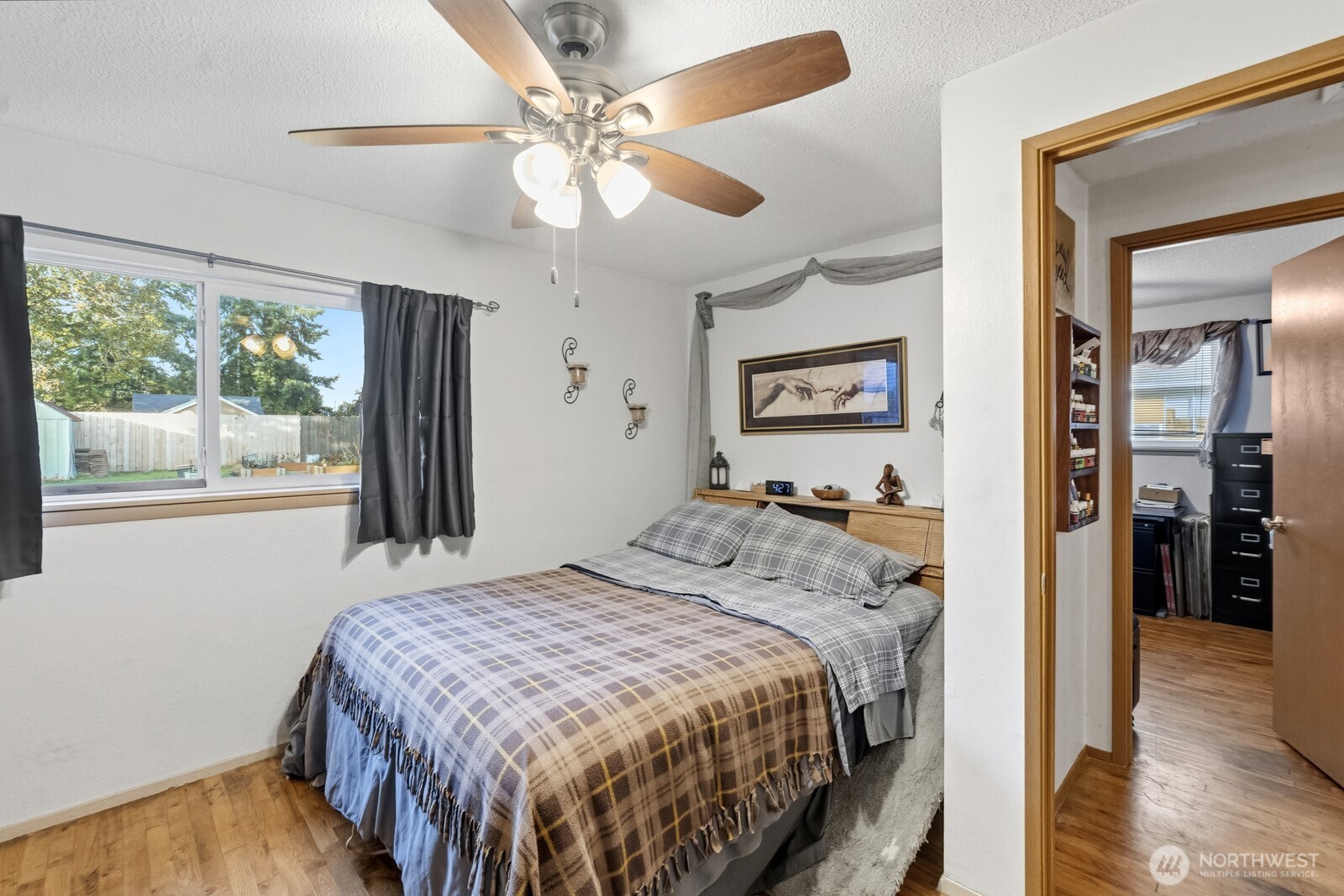 237 167th Street South Spanaway, WA 98387 - Photo 21 of 30 a bedroom with a bed and a large window