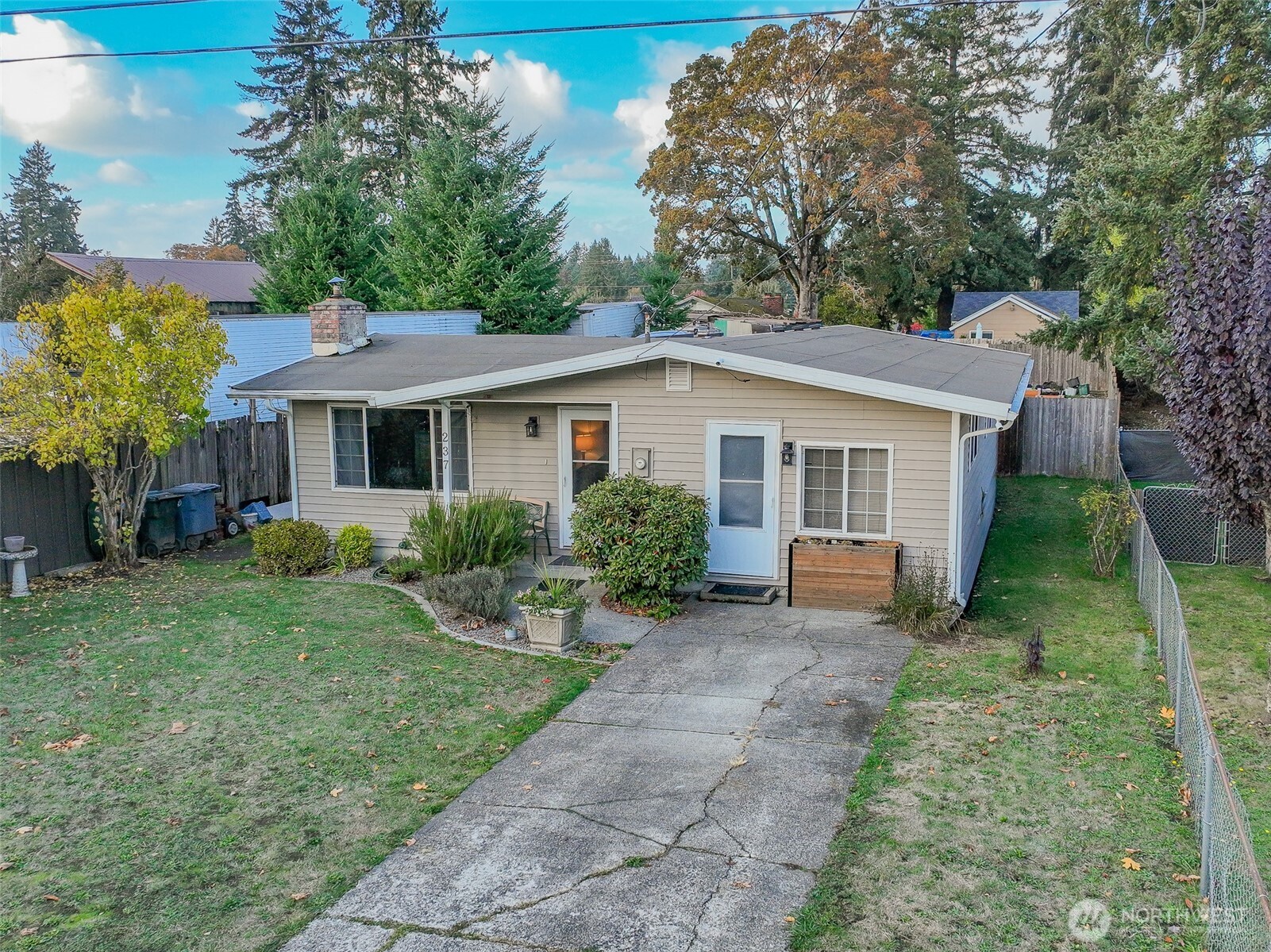 237 167th Street South Spanaway, WA 98387 - Photo 23 of 30 a view of a house with a yard and plants