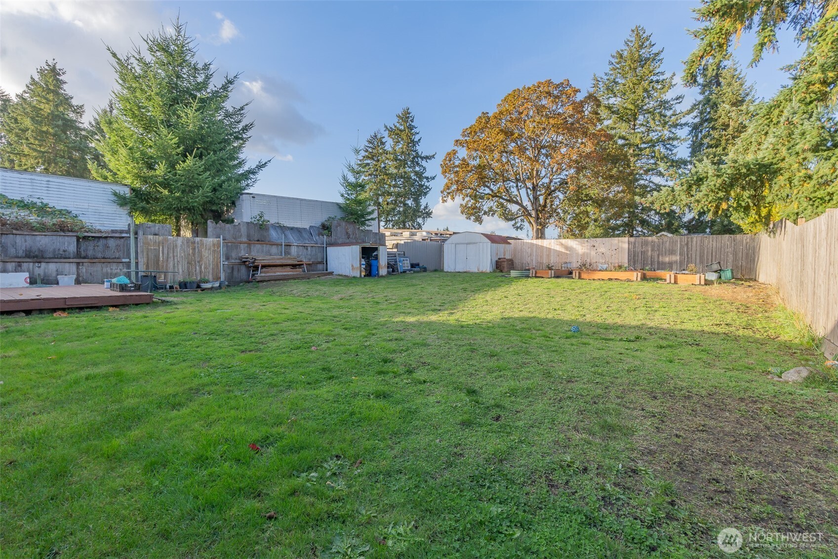 237 167th Street South Spanaway, WA 98387 - Photo 26 of 30 a view of a backyard with a small house