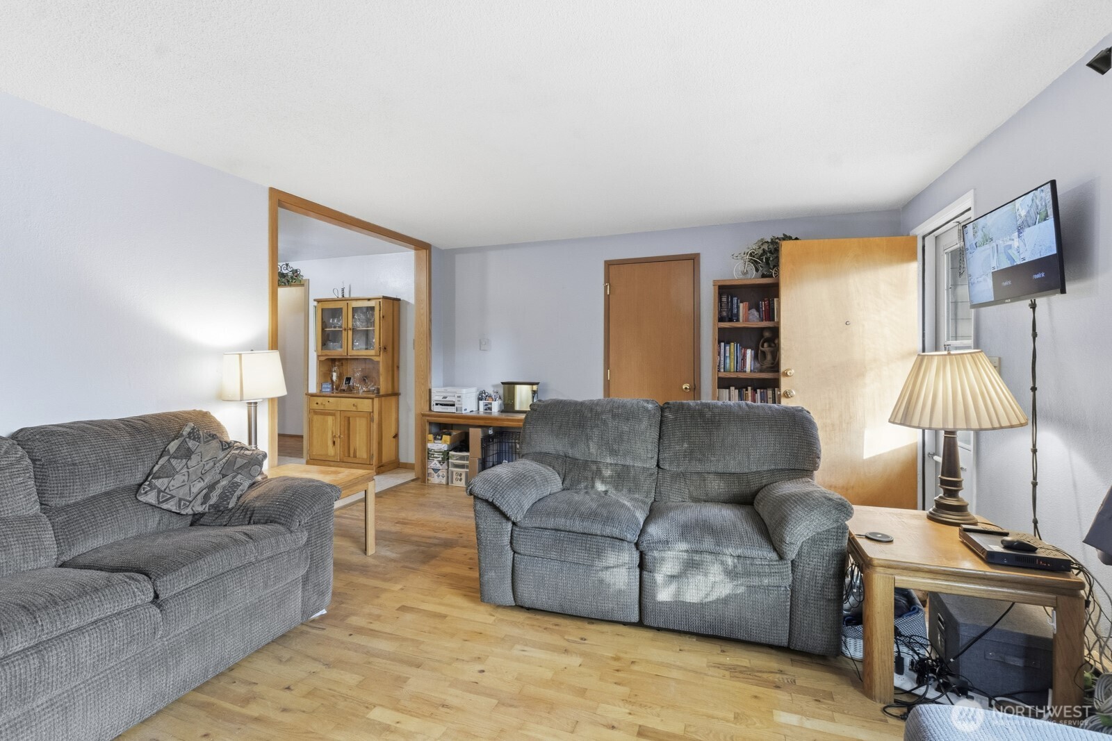 237 167th Street South Spanaway, WA 98387 - Photo 8 of 30 a living room with furniture and a lamp