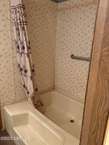 a bathroom with a bathtub