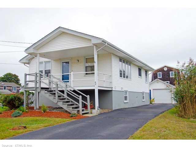 62 Pine Island Road Groton, CT 06340 - Photo 1 of 1 a view of a house with wooden fence