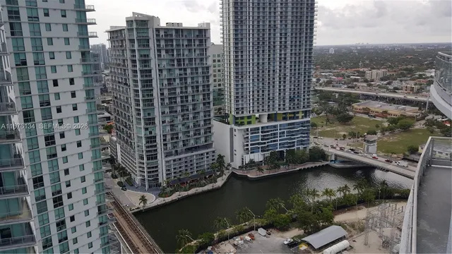 a view of entryway with wooden floor and garden