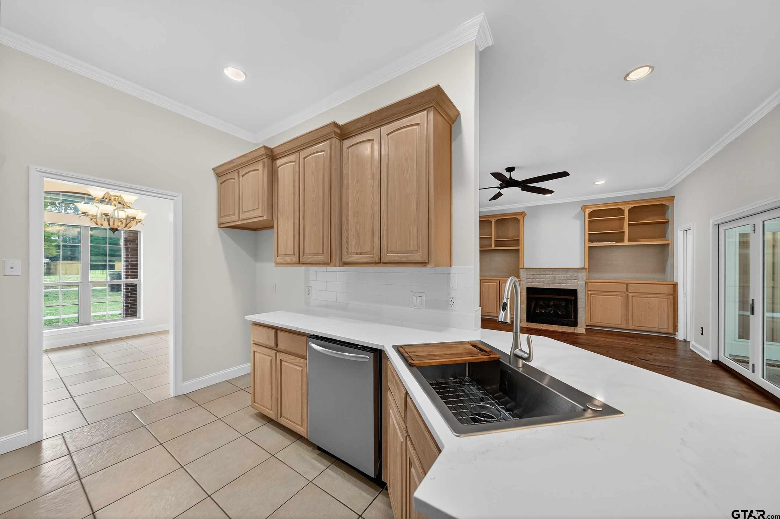21112 Altuda Lane Flint, TX 75762 - Photo 11 of 48 a kitchen that has a sink and a stove top oven