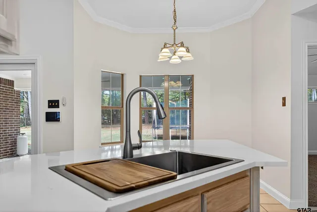 a view of kitchen and sink