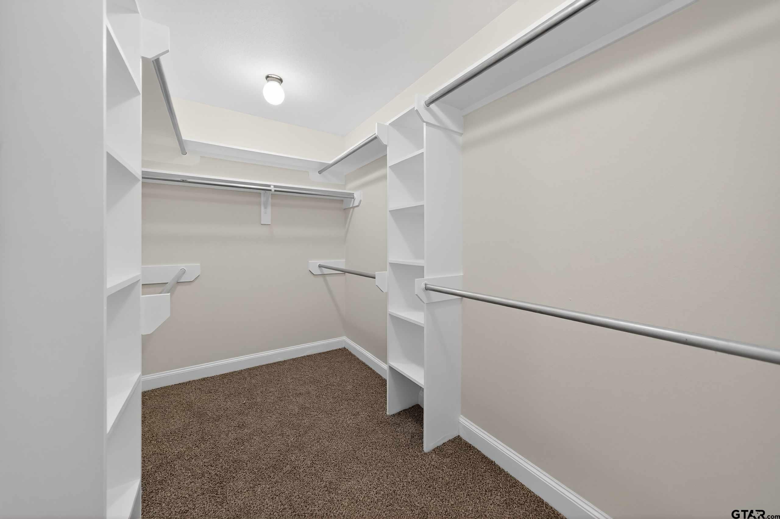 21112 Altuda Lane Flint, TX 75762 - Photo 27 of 48 a view of an empty walk in closet