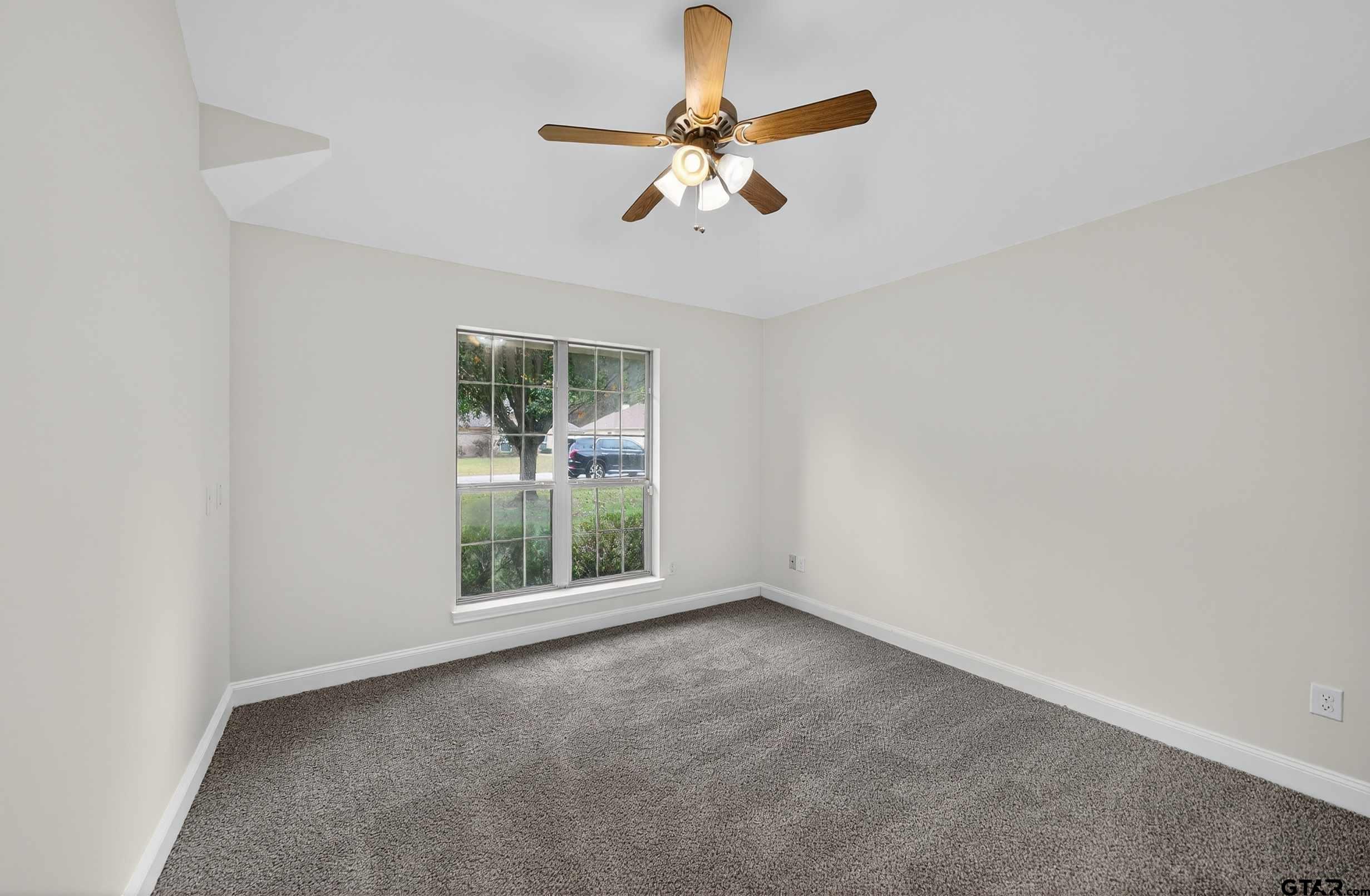 21112 Altuda Lane Flint, TX 75762 - Photo 32 of 48 a view of an empty room with a window