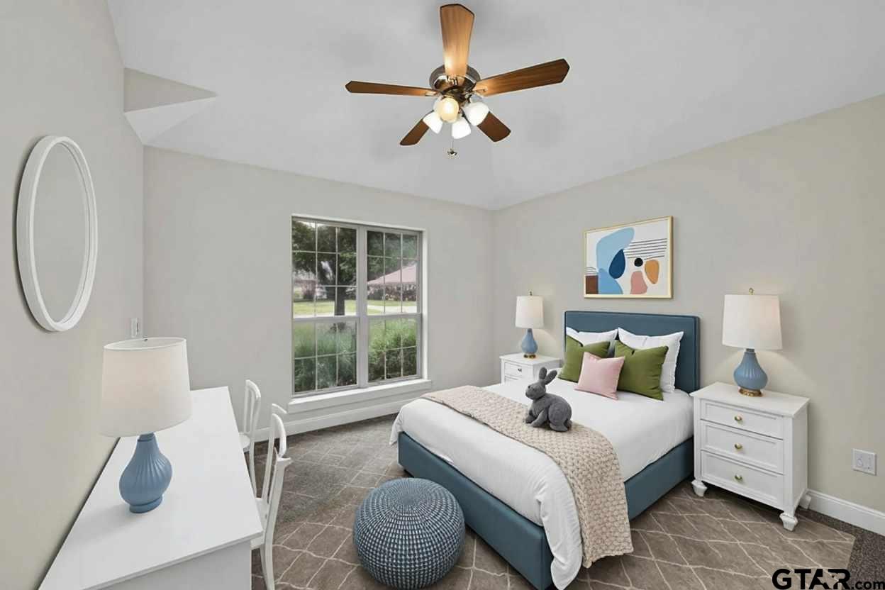 21112 Altuda Lane Flint, TX 75762 - Photo 33 of 48 a bedroom with furniture and a window