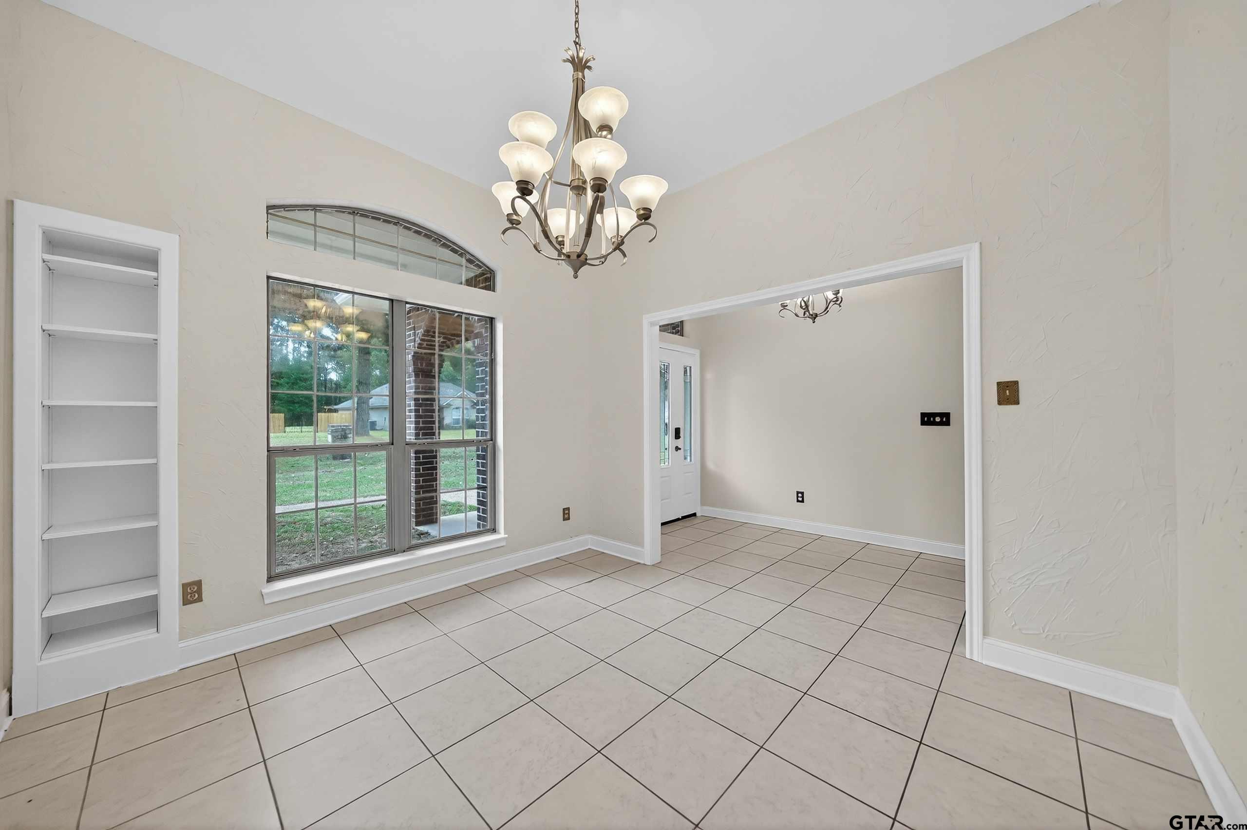 21112 Altuda Lane Flint, TX 75762 - Photo 7 of 48 a view of an empty room with a chandelier
