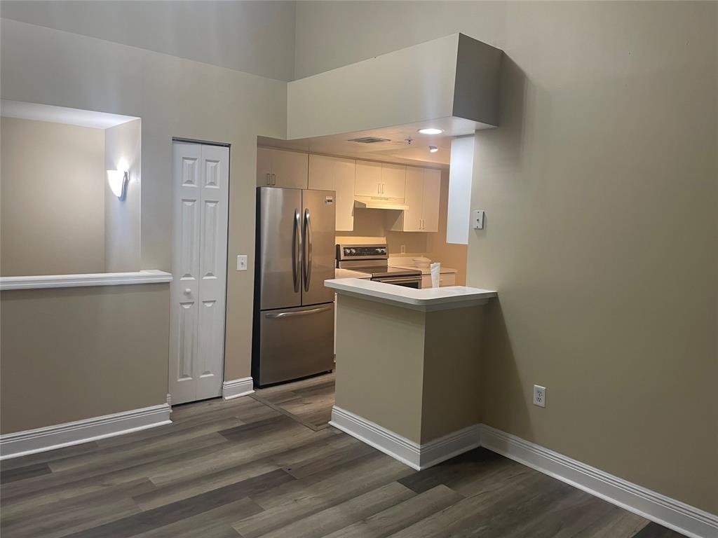 4179 Haverhill Road, Unit 602 West Palm Beach, FL 33417 - Photo 10 of 15 a room with a washer and dryer