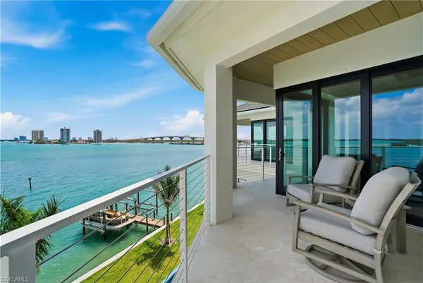 a view of a roof deck with couches