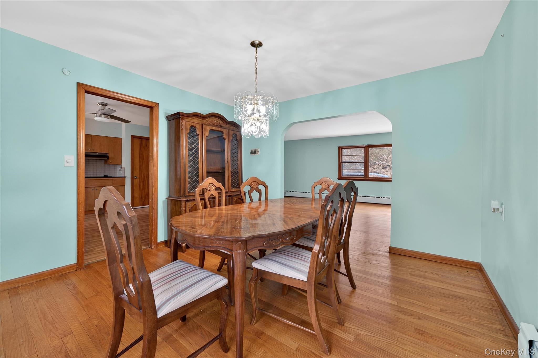 152 Old State Road Highland Falls, NY 10928 - Photo 12 of 38 a view of a dining room with furniture window and wooden floor