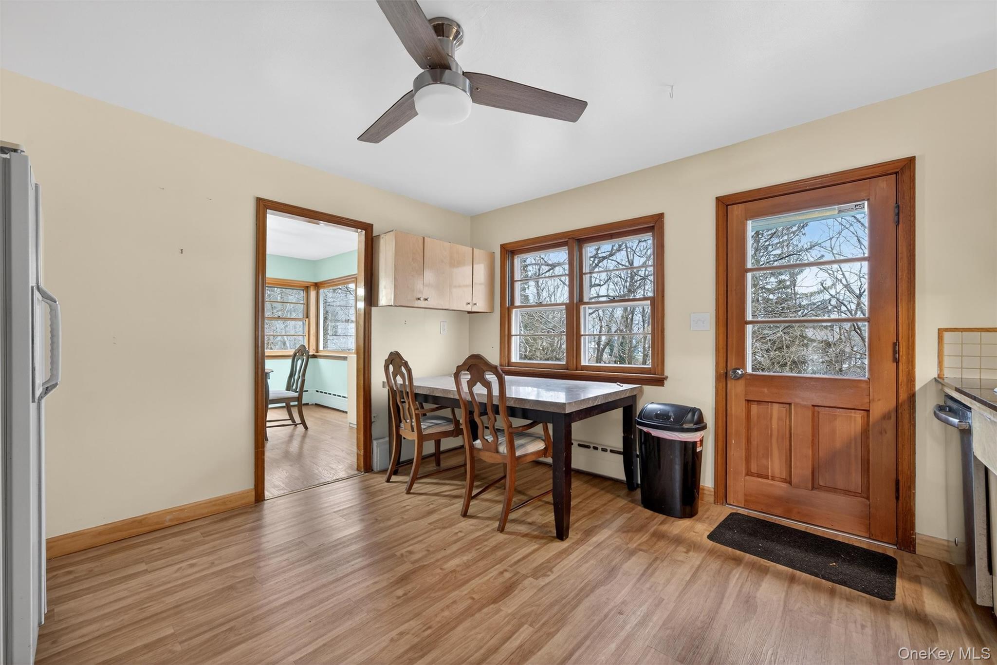 152 Old State Road Highland Falls, NY 10928 - Photo 14 of 38 a view of a dining room with furniture window and wooden floor
