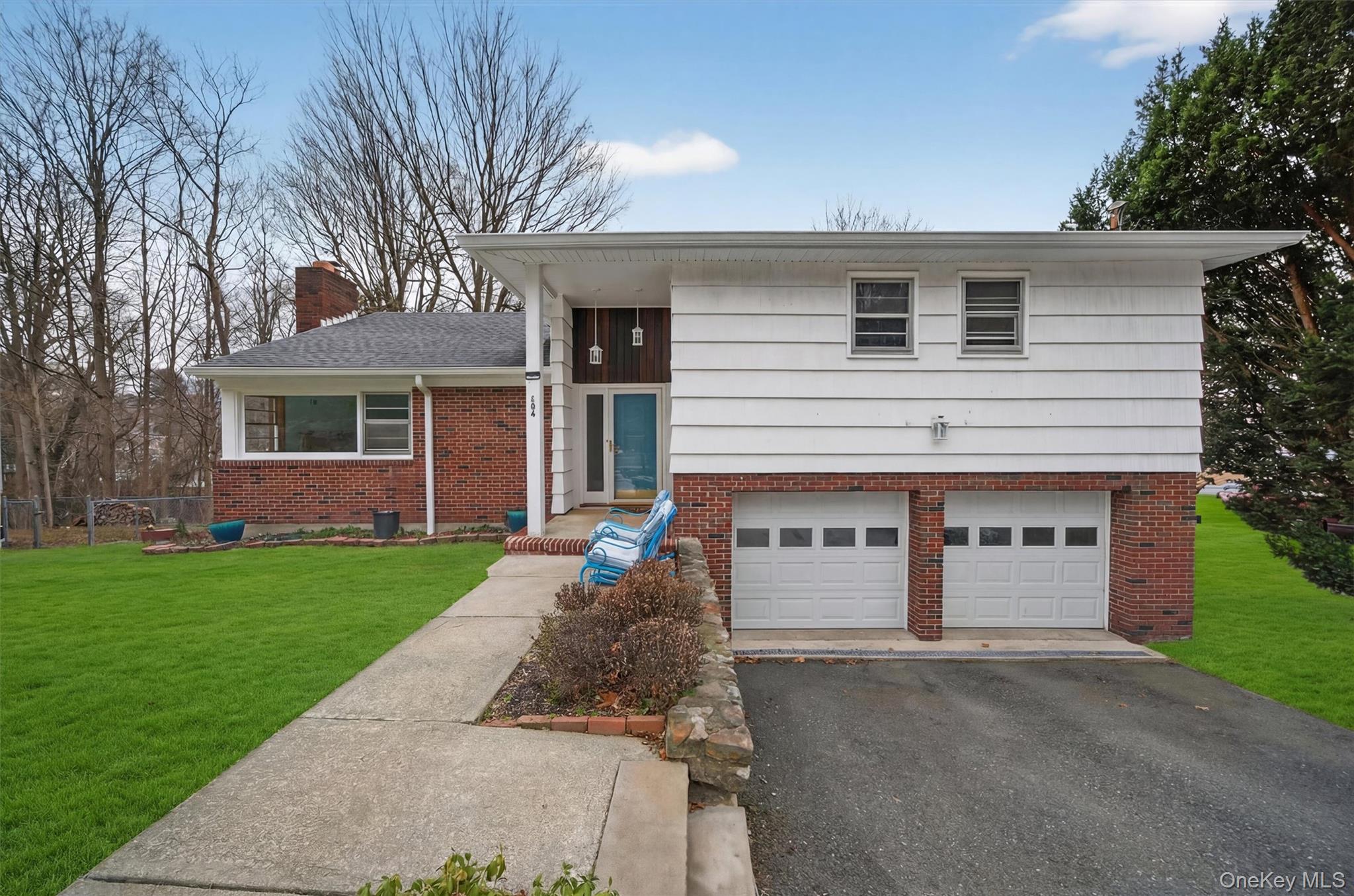 152 Old State Road Highland Falls, NY 10928 - Photo 4 of 38 a view of a white house with a yard and large tree