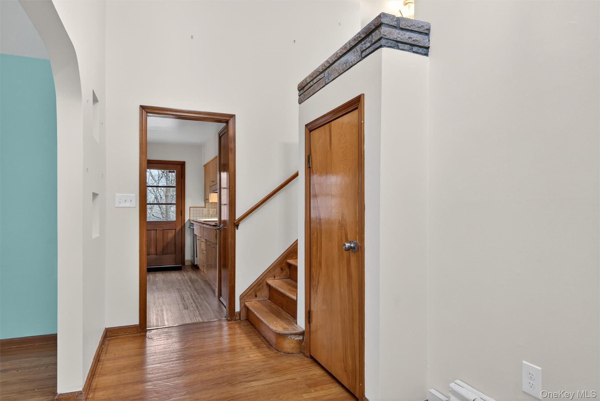 152 Old State Road Highland Falls, NY 10928 - Photo 7 of 38 a view of a hallway with wooden floor and staircase
