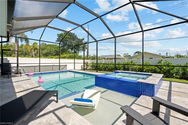 a view of a outdoor sitting area with furniture