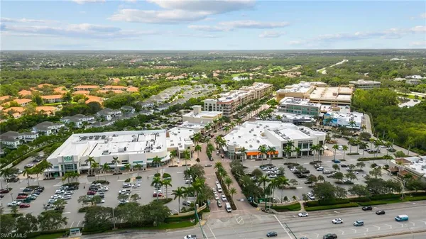 an aerial view of residential building with parking space