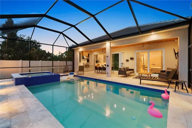 a view of a swimming pool with a patio