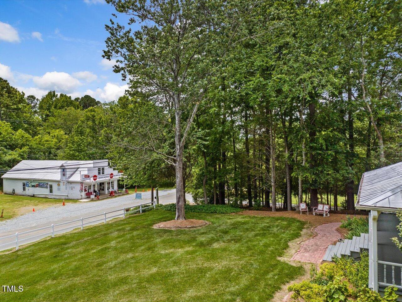 967 Bynum Road Pittsboro, NC 27312 - Photo 17 of 100 a view of a house with swimming pool and sitting area
