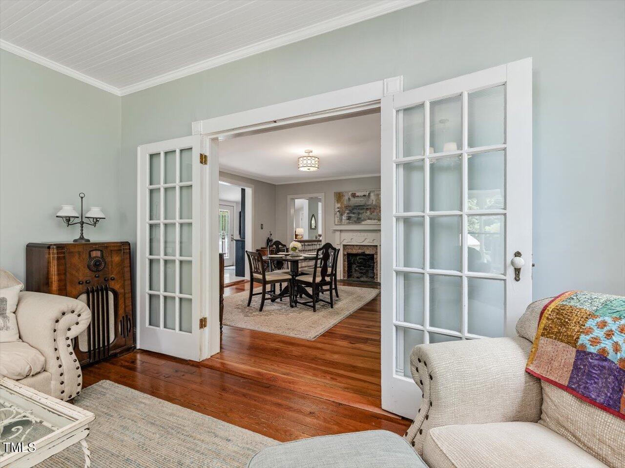 967 Bynum Road Pittsboro, NC 27312 - Photo 24 of 100 a living room with furniture and wooden floor