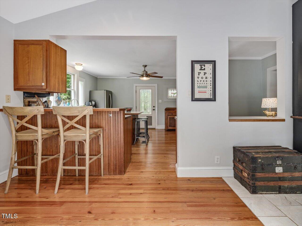 967 Bynum Road Pittsboro, NC 27312 - Photo 37 of 100 a living room with furniture a wooden floor and next to a window