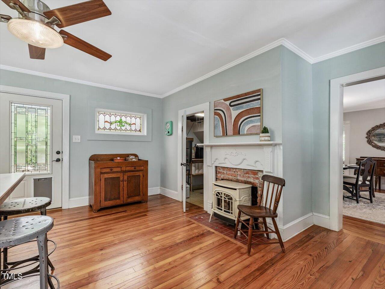967 Bynum Road Pittsboro, NC 27312 - Photo 38 of 100 a living room with furniture and a fireplace