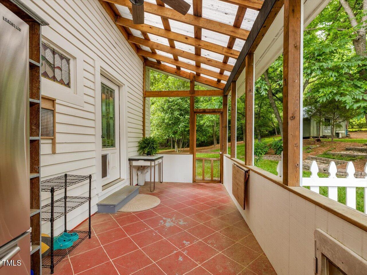 967 Bynum Road Pittsboro, NC 27312 - Photo 41 of 100 a view of a patio with a table chairs and backyard